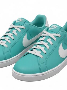 Nike youth size 7 - Turquoise and White Low-Top.  Fits size 8 women’s.